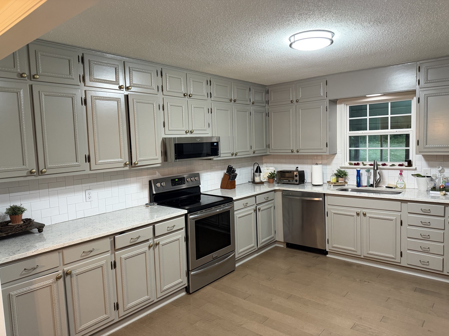 White cabinets and butcher block kitchen renovation